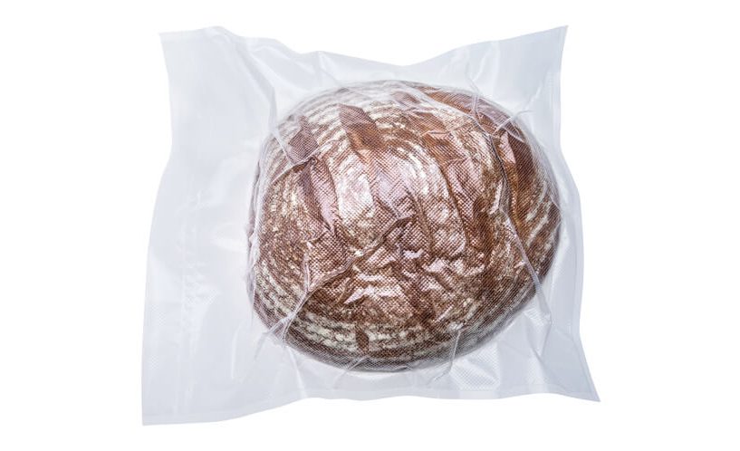 Zavakumiran hljebac kruha u XL vrećici.